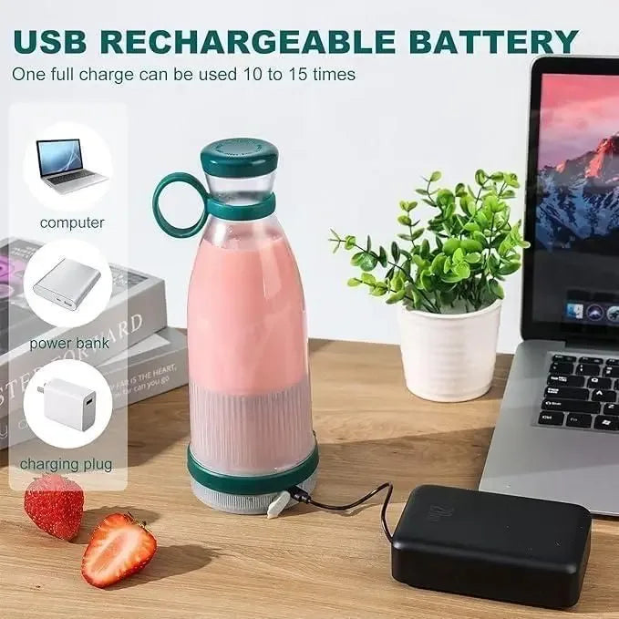 USB rechargeable portable mini juice blender with pink smoothie, charging via power bank on wooden table